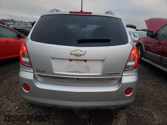 2014 Chevrolet Captiva Sport LTZ с VIN 3GNAL4EK3ES667309, выставлен на аукционе Copart как лот 81964284 с пробегом 106 238 миль миль и Списание • Salvage title. История ставок и продаж доступна на DreamBid. Изображение 6.