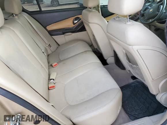 2006 Chevrolet Malibu LTZ z VIN 1G1ZU53866F287322, wystawiony jako Copart lot #70529515 z przebiegiem Nie podano mil oraz Szkoda całkowita • Salvage title. Historia ofert i sprzedaży dostępna na DreamBid. Obrazek 10.