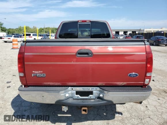 ✅ 1999 Ford F-150 • VIN: 1FTRX18W8XKB18488 • Lot: 71613565. Wystawiony na Copart z przebiegiem Nie podano. Bezpłatny archiwum sprzedaży aukcyjnych z USA i szczegółowy raport historii pojazdu na DreamBid. Zdjęcie 6.