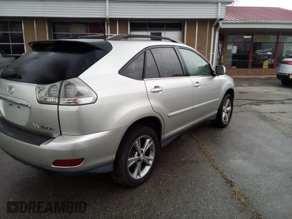 ✅ 2006 Lexus RX 400h • VIN: JTJHW31U560025521 • Lot: 93897055. Wystawiony na Copart z przebiegiem 174 721 mil. Bezpłatny archiwum sprzedaży aukcyjnych z USA i szczegółowy raport historii pojazdu na DreamBid. Zdjęcie 4.