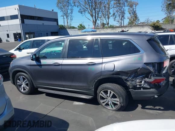 ✅ 2017 Honda Pilot EX-L • VIN: 5FNYF5H59HB030884 • Lot: 43118488. Listed on IAAI with 69,489 mi. Free auction sales archive from the USA and detailed vehicle history report at DreamBid. Image 14.
