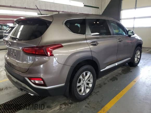 ✅ 2019 Hyundai Santa Fe SE • VIN: 5NMS2CAD4KH092982 • Lot: 70875062. Wystawiony na Copart z przebiegiem 107 862 mil. Bezpłatny archiwum sprzedaży aukcyjnych z USA i szczegółowy raport historii pojazdu na DreamBid. Zdjęcie 3.