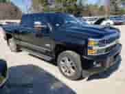 2017 Chevrolet Silverado 2500HD High Country с VIN 1GC1KXEY3HF111558, выставлен на аукционе Copart как лот 53646535 с пробегом 99 592 миль миль и Списание • Salvage title. История ставок и продаж доступна на DreamBid. Изображение 4.