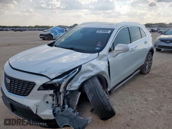 ✅ 2022 Cadillac XT4 FWD Premium Luxury • VIN: 1GYFZCR40NF105398 • Лот: 85189695. Опубликован ранее на Copart с пробегом 79 530 миль. Бесплатный доступ к архиву аукционных продаж из США и подробный отчёт об истории автомобиля на DreamBid. Изображение 1.