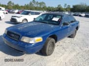 ✅ 2002 Ford Police Interceptor • VIN: 2FAFP71W72X157701 • Lot: 43719670. Listed on IAAI with 155,894 mi. Free auction sales archive from the USA and detailed vehicle history report at DreamBid. Image 2.