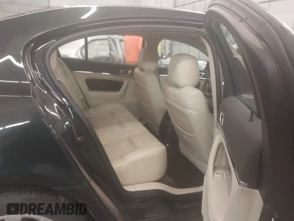 ✅ 2014 Lincoln MKS • VIN: 1LNHL9EK9EG600907 • Лот: 43160190. Опубликован ранее на IAAI с пробегом 127 627 миль. Бесплатный доступ к архиву аукционных продаж из США и подробный отчёт об истории автомобиля на DreamBid. Изображение 8.