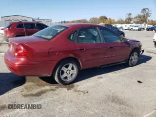 ✅ 2002 Ford Taurus SEL Deluxe • VIN: 1FAHP56S52A190899 • Lot: 91326005. Listed on Copart with 131,094 mi. Free auction sales archive from the USA and detailed vehicle history report at DreamBid. Image 3.