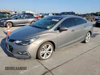 ✅ 2018 Chevrolet Cruze Premier • VIN: 1G1BF5SM3J7222361 • Лот: 69015925. Опубликован ранее на Copart с пробегом 49 990 миль. Бесплатный доступ к архиву аукционных продаж из США и подробный отчёт об истории автомобиля на DreamBid. Изображение 1.