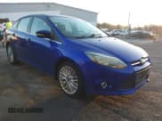 ✅ 2014 Ford Focus Titanium • VIN: 1FADP3J29EL409690 • Лот: 43805489. Опубликован ранее на IAAI с пробегом Не указан. Бесплатный доступ к архиву аукционных продаж из США и подробный отчёт об истории автомобиля на DreamBid. Изображение 1.