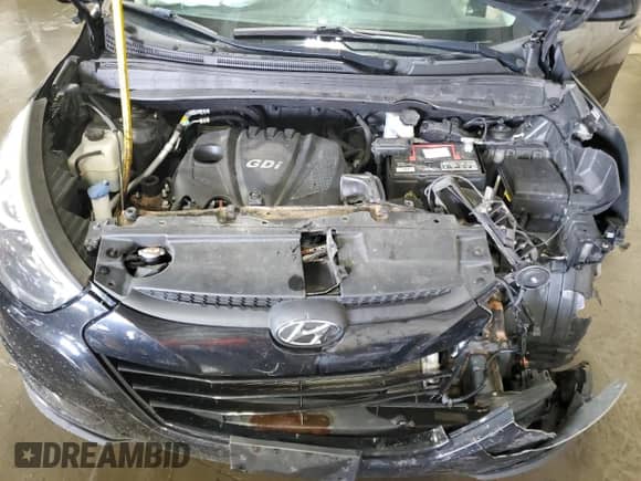 2014 Hyundai Tucson SE z VIN KM8JUCAG8EU828394, wystawiony jako Copart lot #63650005 z przebiegiem 141 656 mil mil oraz Szkoda całkowita • Salvage title. Historia ofert i sprzedaży dostępna na DreamBid. Obrazek 12.