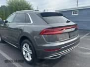 ✅ 2019 Audi Q8 Premium • VIN: WA1AVAF17KD018920 • Lot: 80179365. Wystawiony na Copart z przebiegiem 118 251 mil. Bezpłatny archiwum sprzedaży aukcyjnych z USA i szczegółowy raport historii pojazdu na DreamBid. Zdjęcie 3.