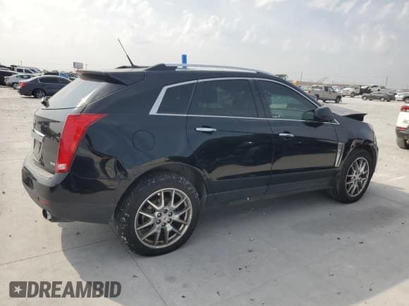 ✅ 2013 Cadillac SRX Premium Collection • VIN: 3GYFNEE37DS639030 • Лот: 90030735. Опубликован ранее на Copart с пробегом 122 839 миль. Бесплатный доступ к архиву аукционных продаж из США и подробный отчёт об истории автомобиля на DreamBid. Изображение 3.