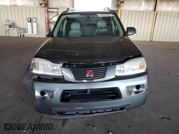 2007 Saturn VUE V6 z VIN 5GZCZ53467S860321, wystawiony jako Copart lot #84924024 z przebiegiem Nie podano mil oraz Szkoda całkowita • Salvage title. Historia ofert i sprzedaży dostępna na DreamBid. Obrazek 5.