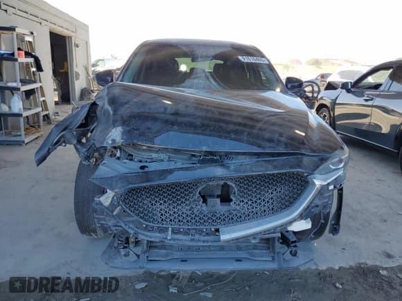 ✅ 2018 Mazda CX-5 Touring • VIN: JM3KFBCM6J0306985 • Lot: 91616465. Wystawiony na Copart z przebiegiem 106 570 mil. Bezpłatny archiwum sprzedaży aukcyjnych z USA i szczegółowy raport historii pojazdu na DreamBid. Zdjęcie 5.