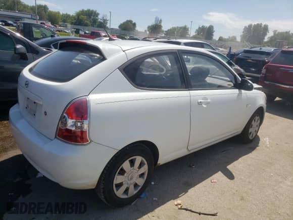 2007 Hyundai Accent GS with VIN KMHCM36C27U030166, listed as a Copart auction lot 67738154 with 174,856 mi miles and Salvage title. Bid and sale history available at DreamBid. Image 3.