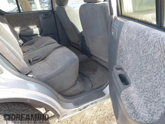 ✅ 2002 Isuzu Rodeo • VIN: 4S2DM58W924321403 • Лот: 41503572. Опубликован ранее на IAAI с пробегом 235 072 миль. Бесплатный доступ к архиву аукционных продаж из США и подробный отчёт об истории автомобиля на DreamBid. Изображение 8.