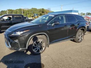 ✅ 2018 Lexus RX 450hL Premium • VIN: JTJDGKCA0J2005280 • Lot: 82425615. Listed on Copart with 60,038 mi. Free auction sales archive from the USA and detailed vehicle history report at DreamBid. Image 1.