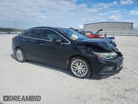 ✅ 2017 Chevrolet Cruze Premier • VIN: 1G1BF5SM2H7183076 • Lot: 82292355. Listed on Copart with 163,304 mi. Free auction sales archive from the USA and detailed vehicle history report at DreamBid. Image 4.