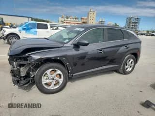 ✅ 2022 Hyundai Tucson SE • VIN: 5NMJA3AE6NH001769 • Лот: 82674535. Опубликован ранее на Copart с пробегом 68 160 миль. Бесплатный доступ к архиву аукционных продаж из США и подробный отчёт об истории автомобиля на DreamBid. Изображение 1.