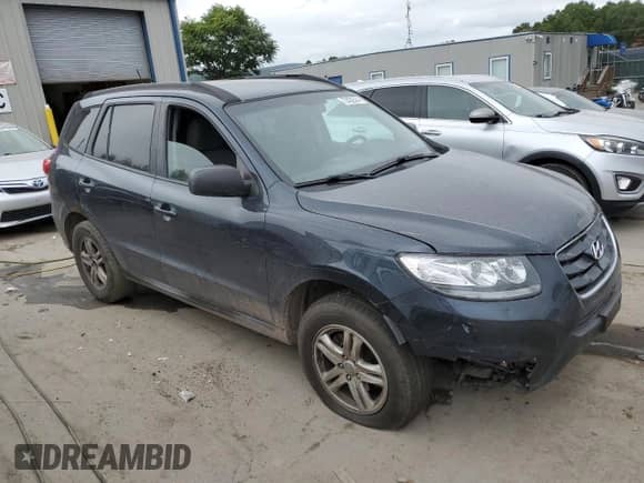 2011 Hyundai Santa Fe GLS z VIN 5XYZGDAB0BG004590, wystawiony jako Copart lot #72432574 z przebiegiem 245 132 mil mil oraz Szkoda całkowita • Salvage title. Historia ofert i sprzedaży dostępna na DreamBid. Obrazek 4.