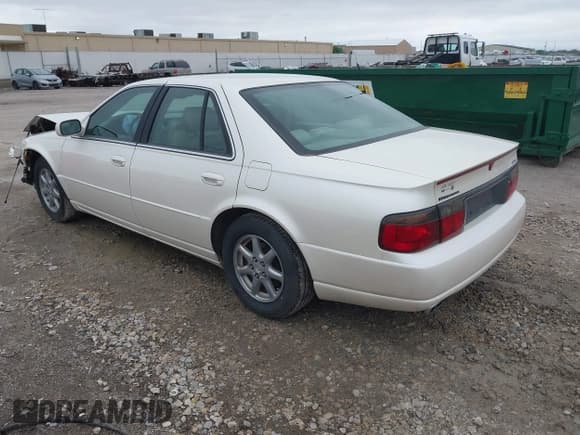 ✅ 2001 Cadillac Seville Touring STS • VIN: 1G6KY54941U215997 • Lot: 42118257. Listed on IAAI with 80,670 mi. Free auction sales archive from the USA and detailed vehicle history report at DreamBid. Image 3.