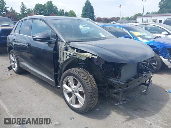 ✅ 2023 Audi Q4 e-tron Prestige • VIN: WA1M2BFZ9PP048668 • Лот: 43028421. Опубликован ранее на IAAI с пробегом 33 109 миль. Бесплатный доступ к архиву аукционных продаж из США и подробный отчёт об истории автомобиля на DreamBid. Изображение 1.