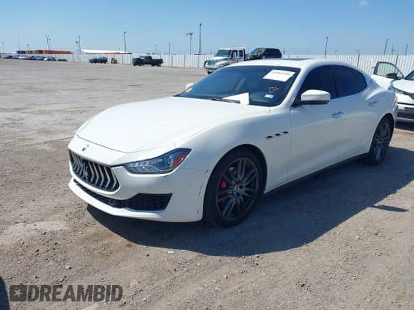 ✅ 2018 Maserati Ghibli • VIN: ZAM57XSA5J1271790 • Lot: 42085940. Wystawiony na IAAI z przebiegiem 91 322 mil. Bezpłatny archiwum sprzedaży aukcyjnych z USA i szczegółowy raport historii pojazdu na DreamBid. Zdjęcie 2.