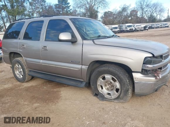 ✅ 2002 Chevrolet Tahoe LT • VIN: 1GNEC13Z52R167375 • Lot: 41332351. Listed on IAAI with 283,486 mi. Free auction sales archive from the USA and detailed vehicle history report at DreamBid. Image 1.