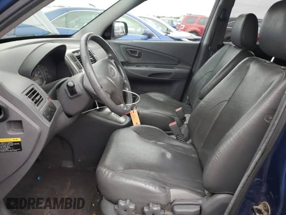 2005 Hyundai Tucson GLS z VIN KM8JN12D25U110054, wystawiony jako Copart lot #79204614 z przebiegiem 228 781 mil mil oraz Szkoda całkowita • Salvage title. Historia ofert i sprzedaży dostępna na DreamBid. Obrazek 7.