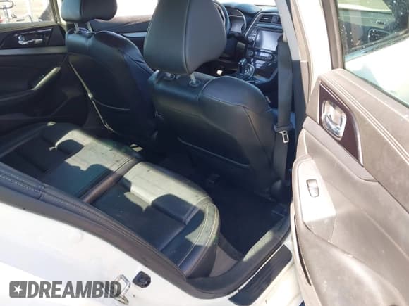 ✅ 2016 Nissan Maxima SL • VIN: 1N4AA6AP9GC449434 • Lot: 43458901. Wystawiony na IAAI z przebiegiem 180 231 mil. Bezpłatny archiwum sprzedaży aukcyjnych z USA i szczegółowy raport historii pojazdu na DreamBid. Zdjęcie 8.