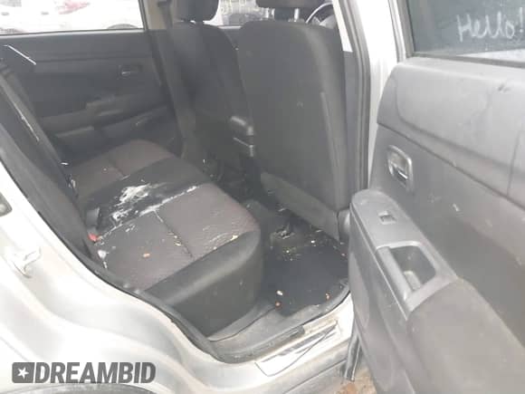 2019 Mitsubishi Outlander ES with VIN JA4AR3AU8KU019804, listed as a IAAI auction lot 40865371 with 92,476 mi miles and . Bid and sale history available at DreamBid. Image 8.