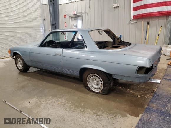 ✅ 1976 Mercedes-Benz SLC • VIN: 10702412013964 • Lot: 90460335. Listed on Copart with 84,495 mi. Free auction sales archive from the USA and detailed vehicle history report at DreamBid. Image 2.