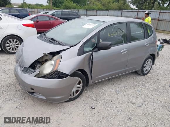 ✅ 2009 Honda Fit • VIN: JHMGE88289C006532 • Lot: 43027357. Listed on IAAI with 208,240 mi. Free auction sales archive from the USA and detailed vehicle history report at DreamBid. Image 2.