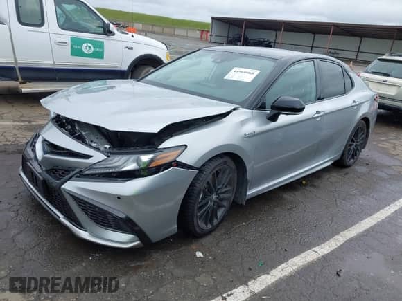 2021 Toyota Camry Hybrid XSE z VIN 4T1K31AK9MU020943, wystawiony jako IAAI lot #41969968 z przebiegiem 33 773 mil mil oraz . Historia ofert i sprzedaży dostępna na DreamBid. Obrazek 2.