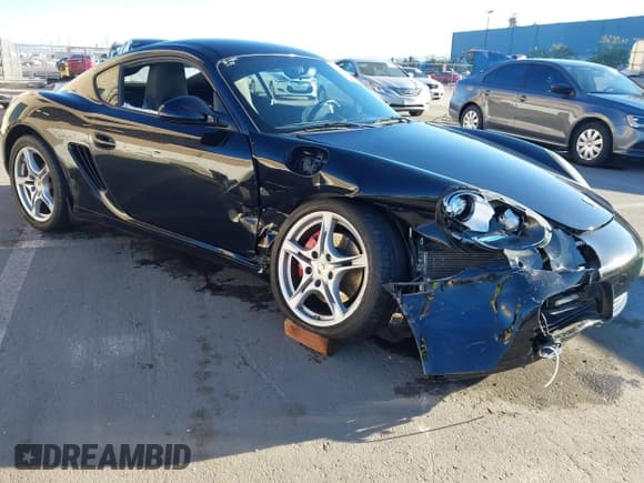 ✅ 2010 Porsche Cayman S • VIN: WP0AB2A88AU780290 • Lot: 41387293. Listed on IAAI with 76,091 mi. Free auction sales archive from the USA and detailed vehicle history report at DreamBid. Image 1.