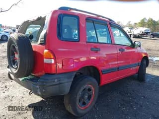 ✅ 2002 Chevrolet Tracker • VIN: 2CNBE13C326917199 • Lot: 43834641. Listed on IAAI with 113,973 mi. Free auction sales archive from the USA and detailed vehicle history report at DreamBid. Image 4.