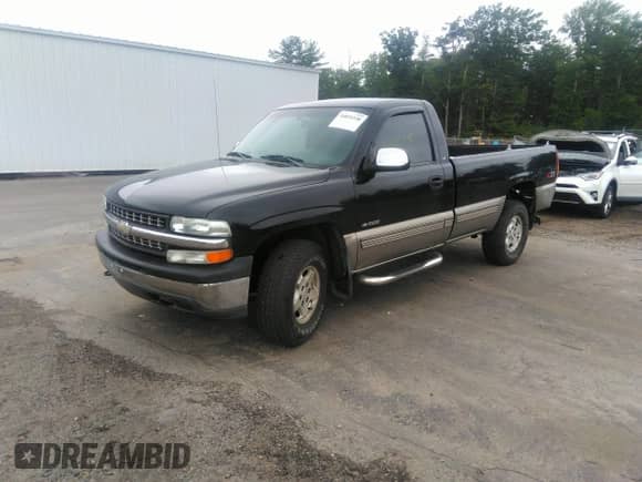 2002 Chevrolet Silverado 1500 LS with VIN 1GCEK14T72Z273185, listed as a IAAI auction lot 34055338 with 123,301 mi miles and . Bid and sale history available at DreamBid. Image 2.