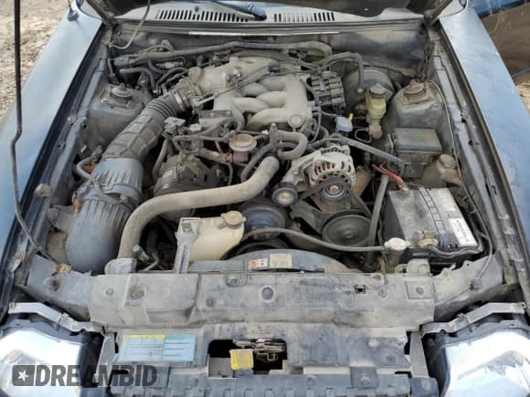 ✅ 2002 Ford Mustang Standard • VIN: 1FAFP40442F218397 • Lot: 82153245. Listed on Copart with 183,356 mi. Free auction sales archive from the USA and detailed vehicle history report at DreamBid. Image 11.