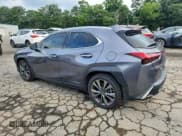 ✅ 2021 Lexus UX 250h F Sport • VIN: JTHR9JBH6M2041702 • Lot: 61157525. Wystawiony na Copart z przebiegiem 64 681 mil. Bezpłatny archiwum sprzedaży aukcyjnych z USA i szczegółowy raport historii pojazdu na DreamBid. Zdjęcie 2.