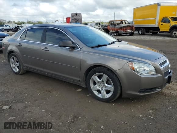 ✅ 2012 Chevrolet Malibu 1LS • VIN: 1G1ZB5E07CF185195 • Lot: 79741894. Listed on Copart with 126,140 mi. Free auction sales archive from the USA and detailed vehicle history report at DreamBid. Image 4.