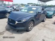 ✅ 2021 Mazda CX-30 Select • VIN: 3MVDMBBL3MM248009 • Lot: 42904343. Listed on IAAI with 75,990 mi. Free auction sales archive from the USA and detailed vehicle history report at DreamBid. Image 2.