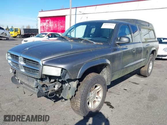 ✅ 2004 Dodge Dakota SLT • VIN: 1D7HG42KX4S748730 • Lot: 41687614. Listed on IAAI with 157,132 mi. Free auction sales archive from the USA and detailed vehicle history report at DreamBid. Image 2.