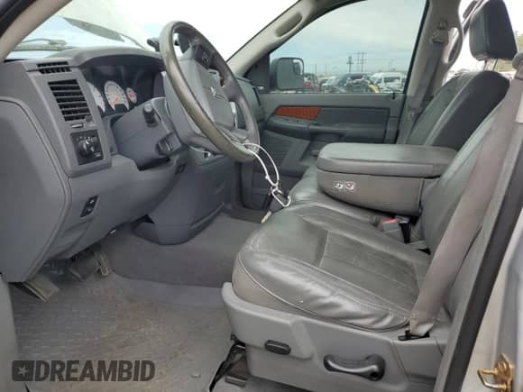 2006 Dodge 1500 Laramie z VIN 1D7HU18266S681822, wystawiony jako Copart lot #64065285 z przebiegiem 183 233 mil mil oraz Szkoda całkowita • Salvage title. Historia ofert i sprzedaży dostępna na DreamBid. Obrazek 7.