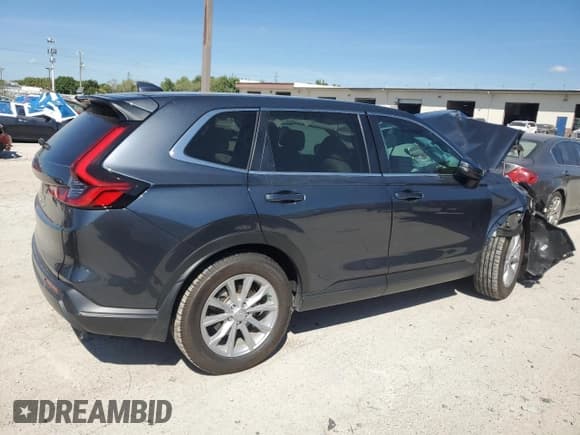 ✅ 2023 Honda CR-V EX-L • VIN: 2HKRS4H77PH418207 • Lot: 71285025. Listed on Copart with Not provided. Free auction sales archive from the USA and detailed vehicle history report at DreamBid. Image 3.