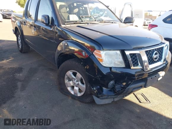 ✅ 2012 Nissan Frontier SV • VIN: 1N6AD0ER0CC479262 • Lot: 43836262. Listed on IAAI with 130,697 mi. Free auction sales archive from the USA and detailed vehicle history report at DreamBid. Image 6.