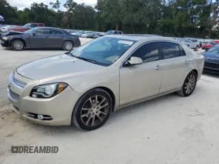 ✅ 2010 Chevrolet Malibu LTZ • VIN: 1G1ZE5EBXAF222116 • Lot: 80787415. Listed on Copart with 165,730 mi. Free auction sales archive from the USA and detailed vehicle history report at DreamBid. Image 1.