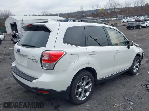 ✅ 2017 Subaru Forester Touring • VIN: JF2SJATC9HH414572 • Lot: 43751206. Listed on IAAI with 102,536 mi. Free auction sales archive from the USA and detailed vehicle history report at DreamBid. Image 4.