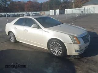 ✅ 2010 Cadillac CTS Premium • VIN: 1G6DP5EV2A0113709 • Lot: 43773450. Listed on IAAI with 259,936 mi. Free auction sales archive from the USA and detailed vehicle history report at DreamBid. Image 1.