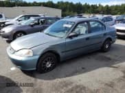 ✅ 1999 Honda Civic LX • VIN: 2HGEJ6572XH533602 • Lot: 80522085. Listed on Copart with 147,278 mi. Free auction sales archive from the USA and detailed vehicle history report at DreamBid. Image 1.