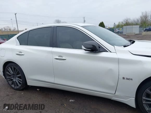 ✅ 2020 Infiniti Q50 Red Sport 400 • VIN: JN1FV7AR0LM660315 • Lot: 41951851. Listed on IAAI with 102,475 mi. Free auction sales archive from the USA and detailed vehicle history report at DreamBid. Image 13.